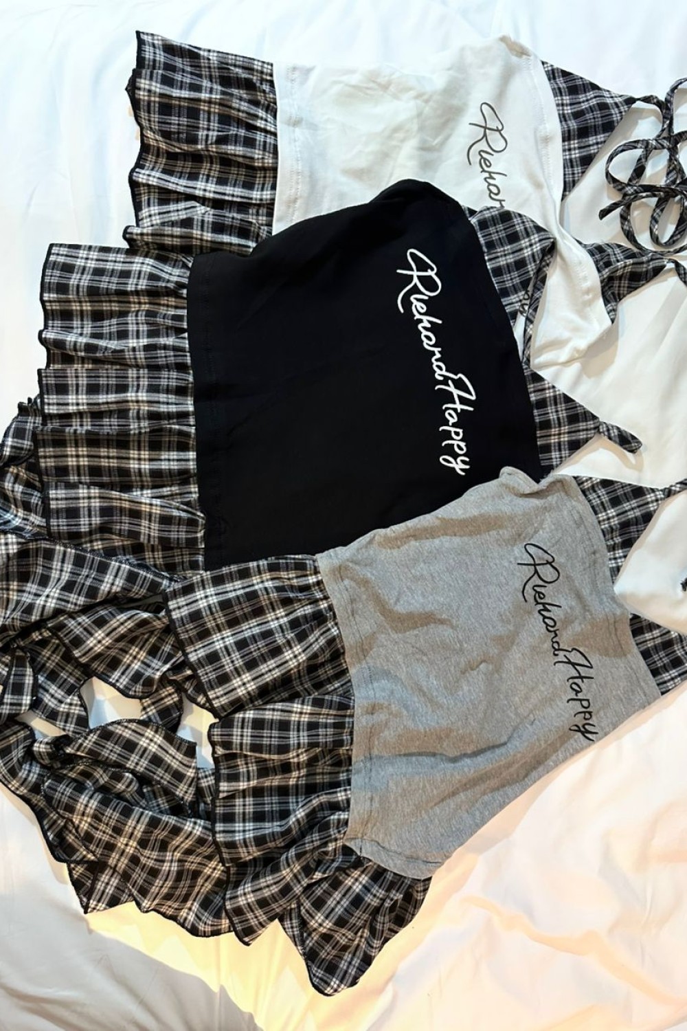 假两件格子吊带